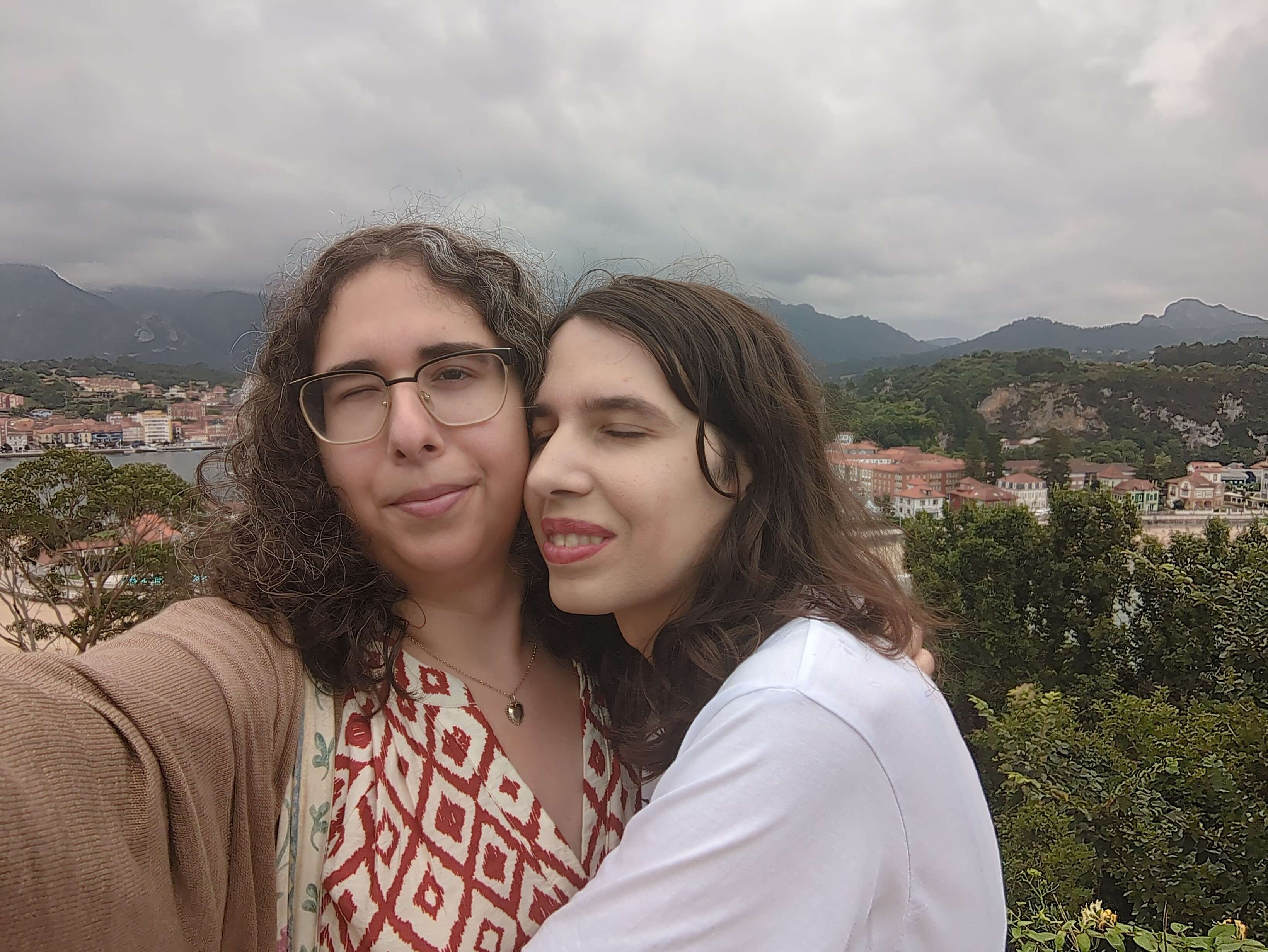 "me and foto overlooking a town"